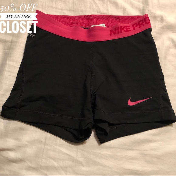 NIKE PRO black spandex shorts with pink waist band